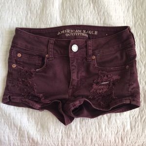 Maroon American Eagle stretch shorts (ripped)